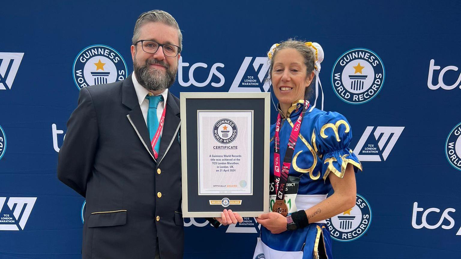 Ms Stewart with her world record certificate