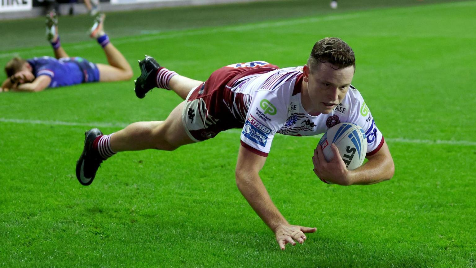 Wigan beat Wakefield to go top of Super League