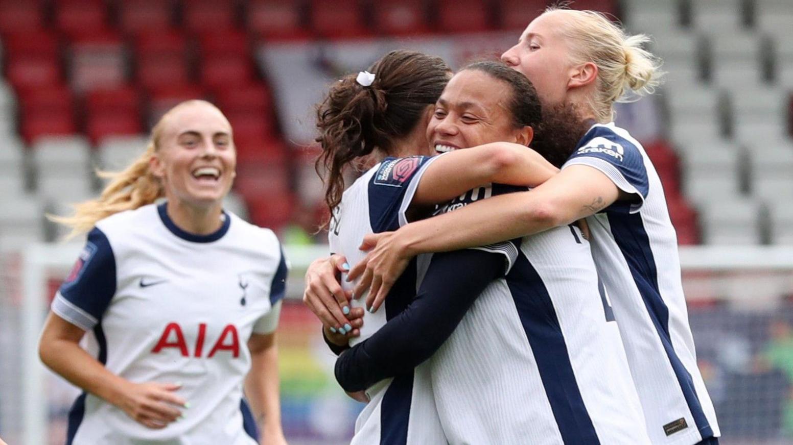 Tottenham players celebrate after Hayley Raso opens the scoring against Crystal Palace in the WSL