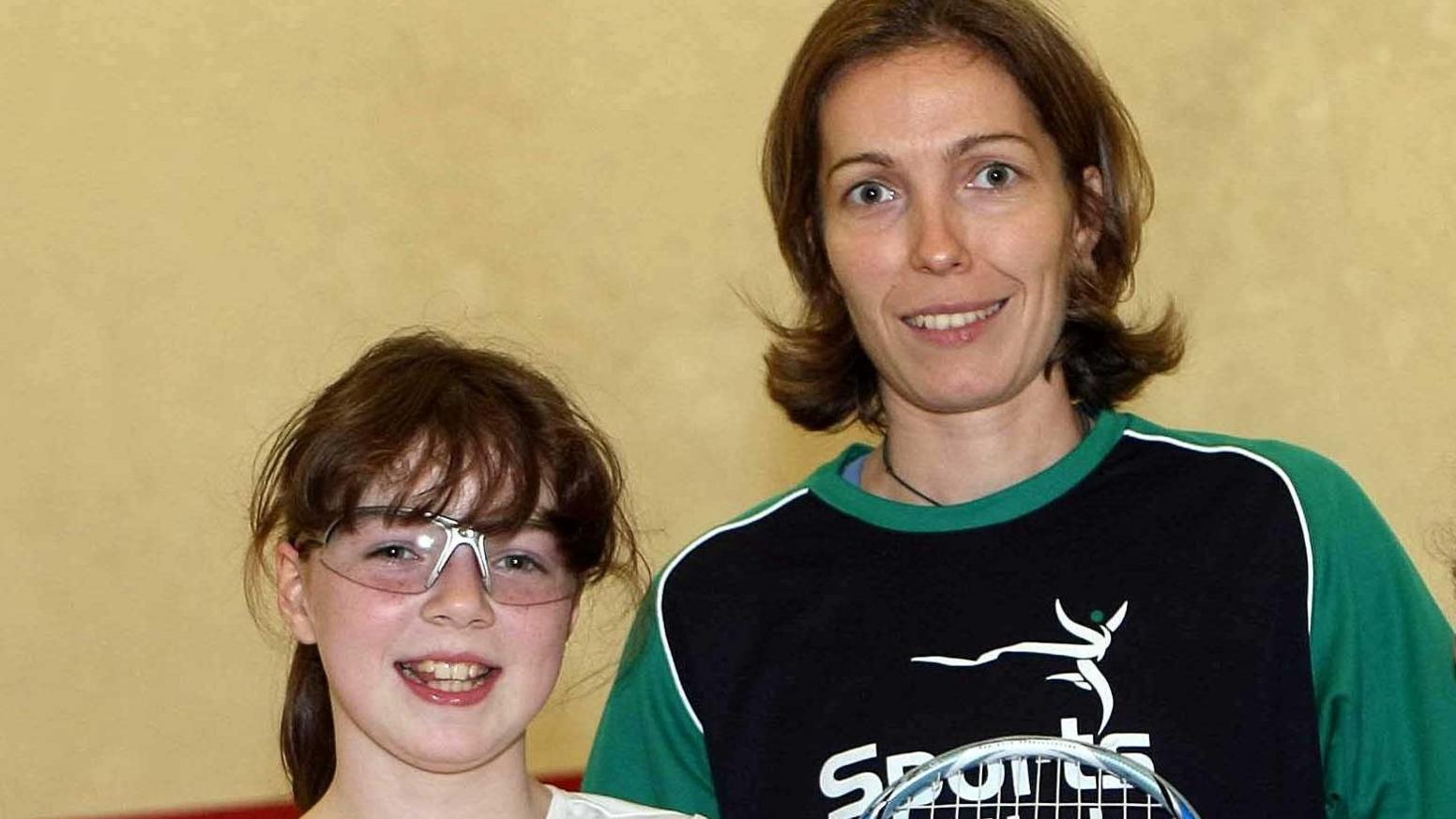 A young Hannah with Madeline Perry