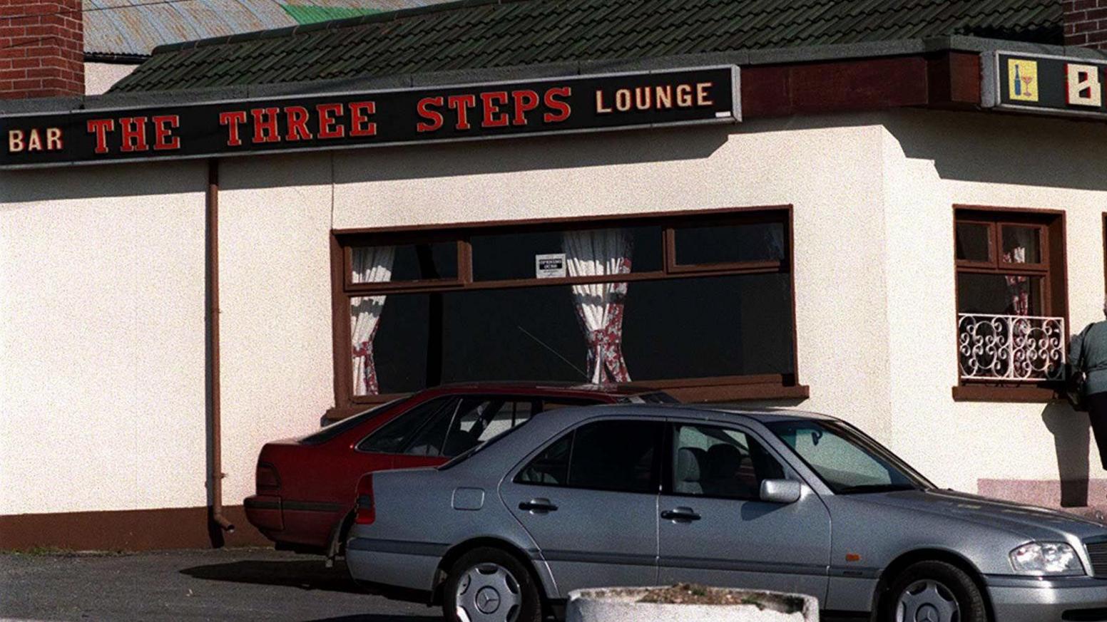 Archive image showing a small pub painted white with The Three Steps name in red letters at the top.