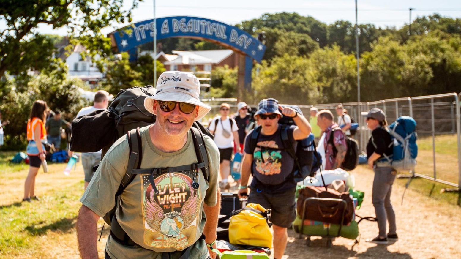 Festivalgoers arriving at Isle of Wight Festival