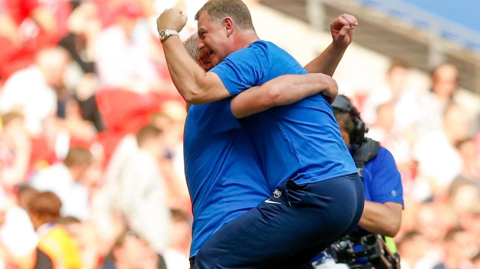 Mark Robins celebrates Coventry's win against Exeter City in the 2018 League Two play-off final