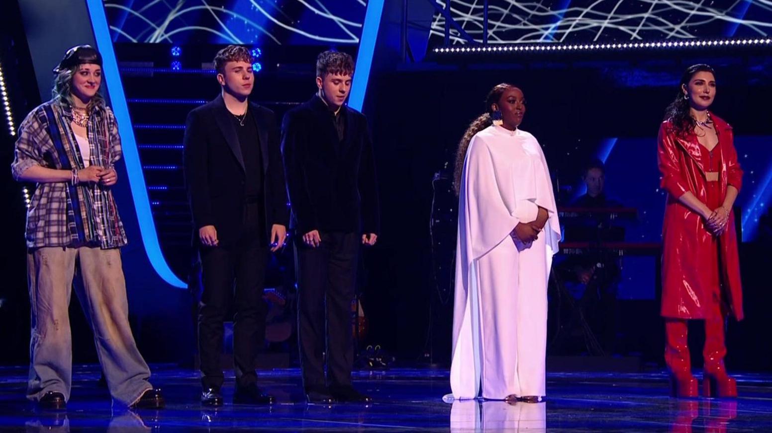 Finalists lined up on the stage (L-R Ava, Billie and Louie, Deb Orah and Storry)