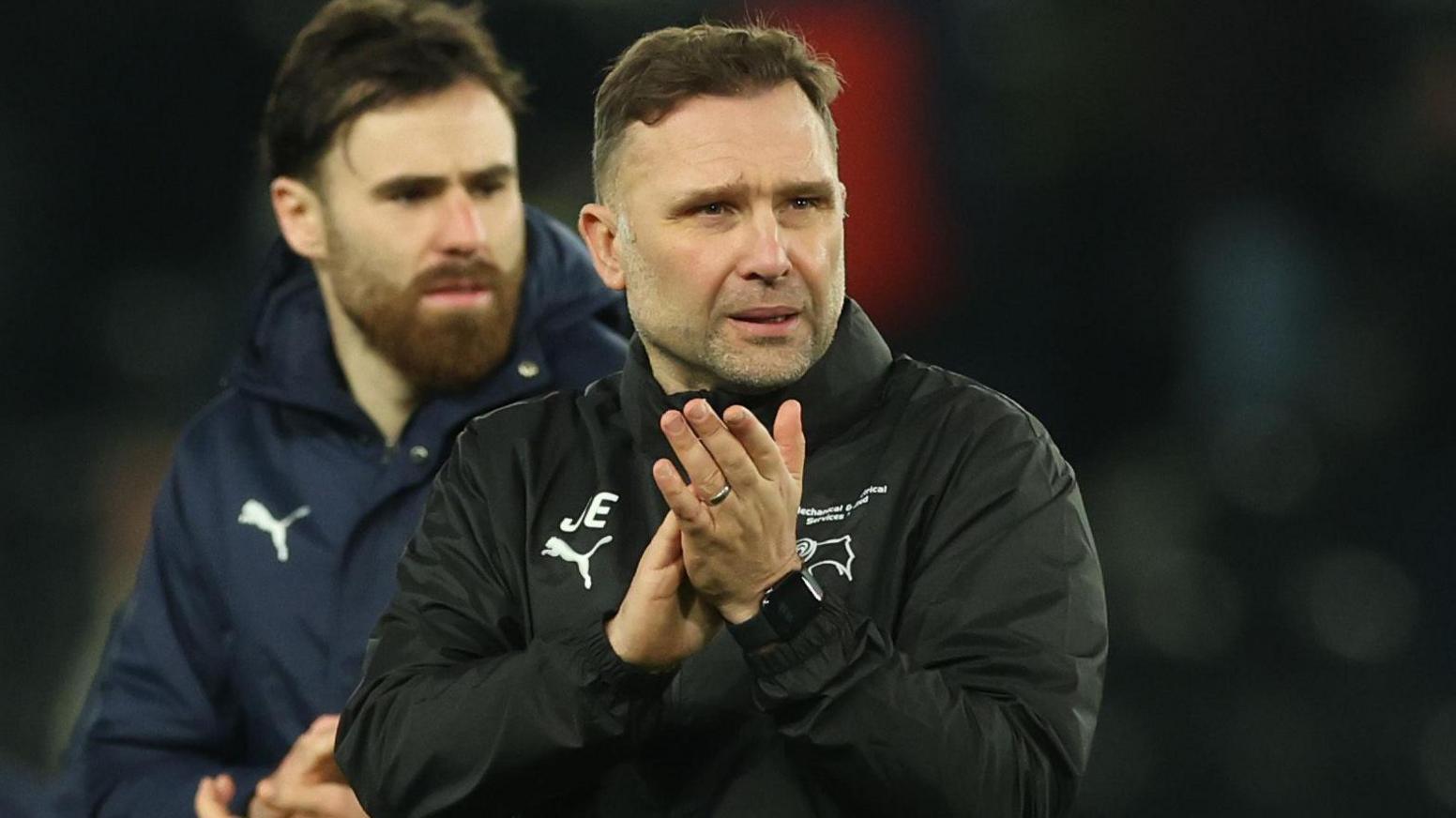 Derby boss John Eustace claps the fans after the 1-1 draw with Portsmouth