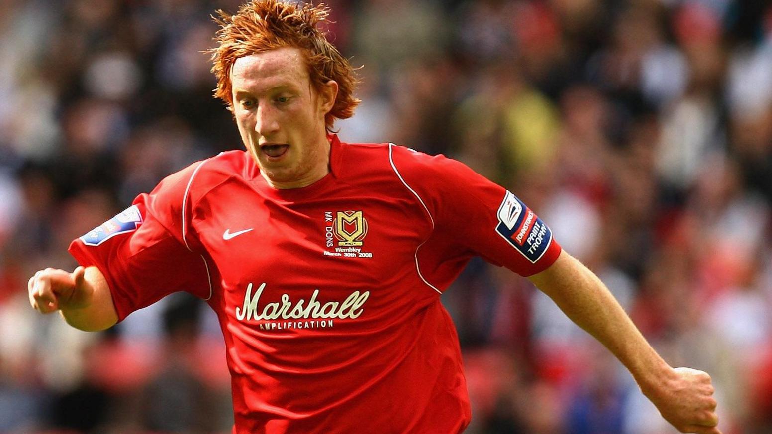 Dean Lewington in action.