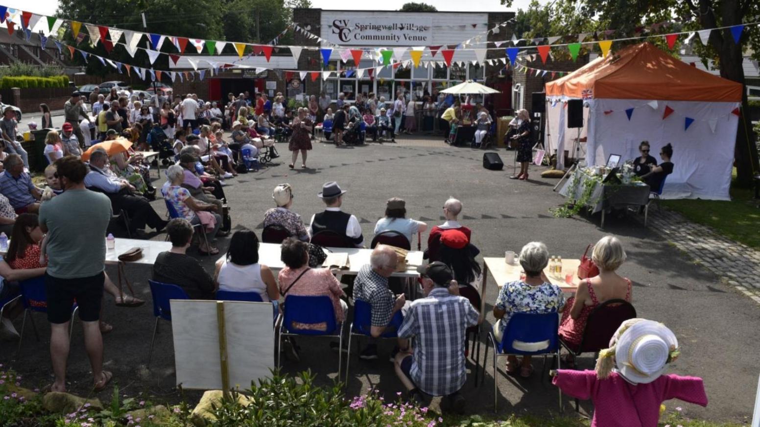 People gathered outside Springwell Village Community Venue during the 1940s weekend