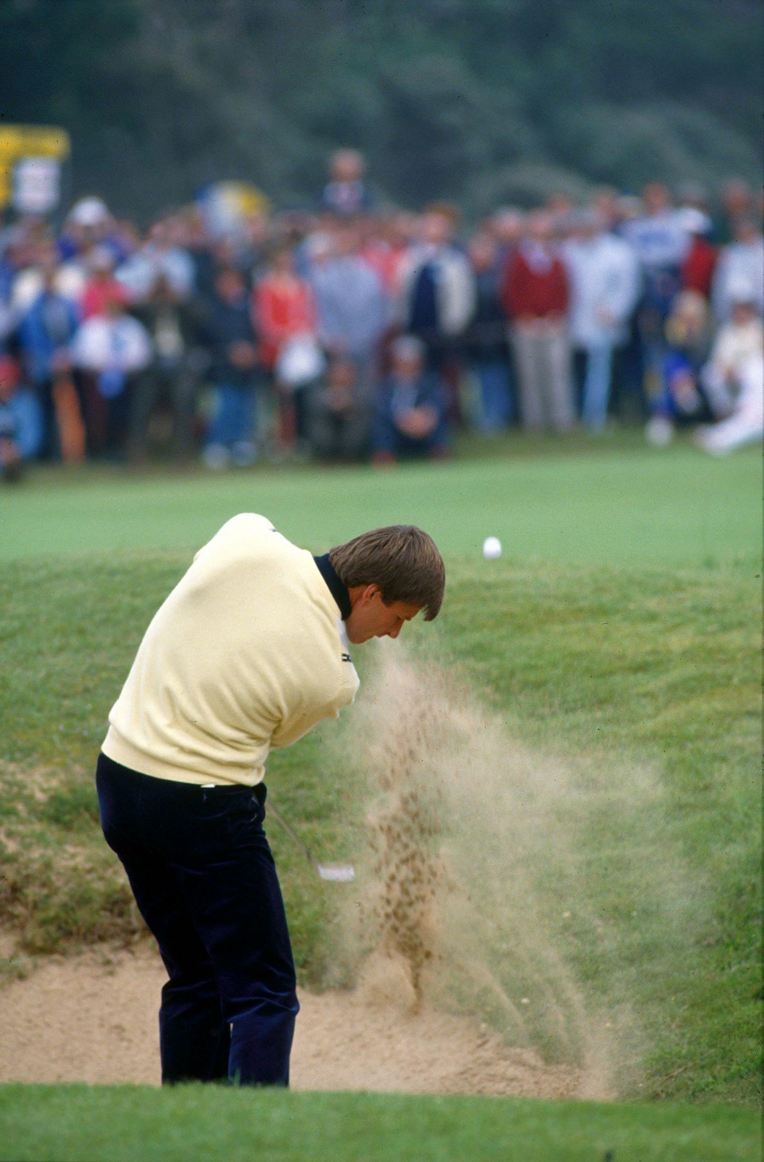 Nick Faldo playing out of a bunker on the eighth hole at Muirfield on his way to winning the 1987 Open Championship