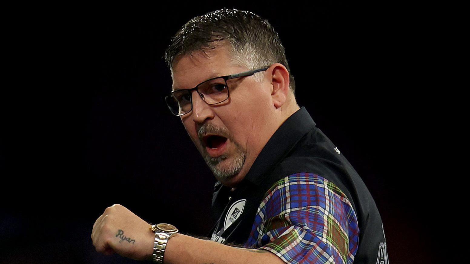 Gary Anderson celebrates