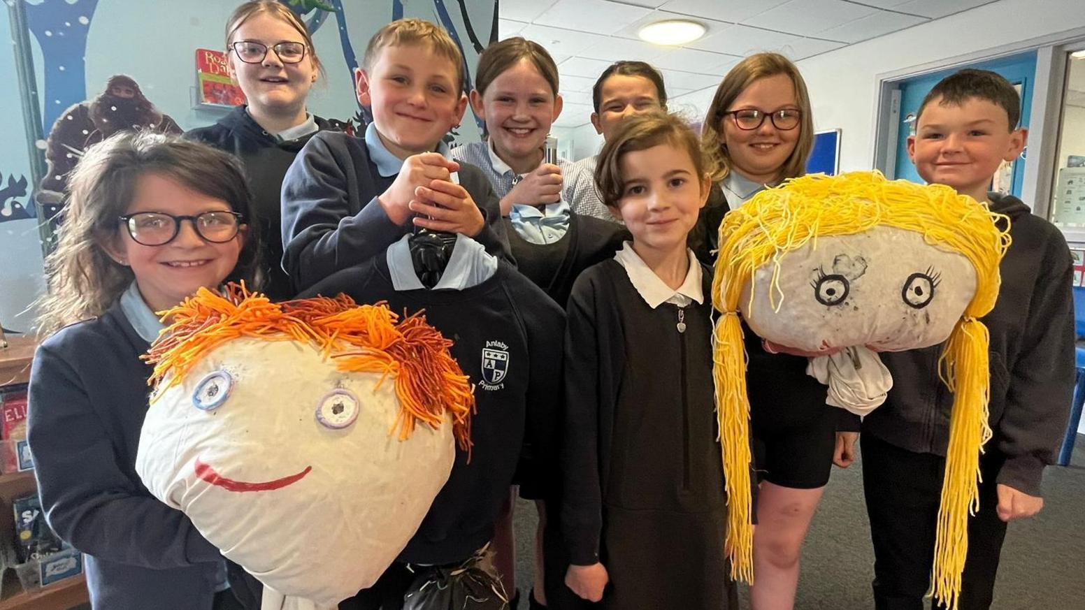 Children at Anlaby Primary School holiday the damaged scarecrows