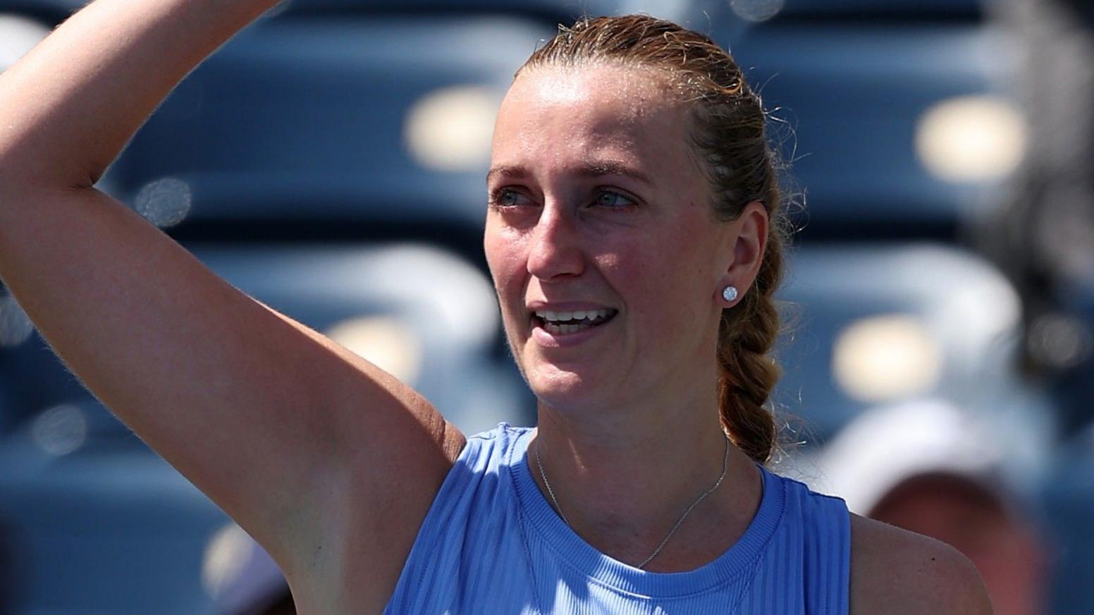 Petra Kvitova waves to the crowd at the US Open following her first-round defeat