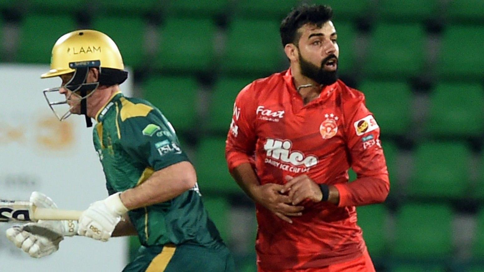 Shadab Khan, right, in action in the Pakistan Premier League