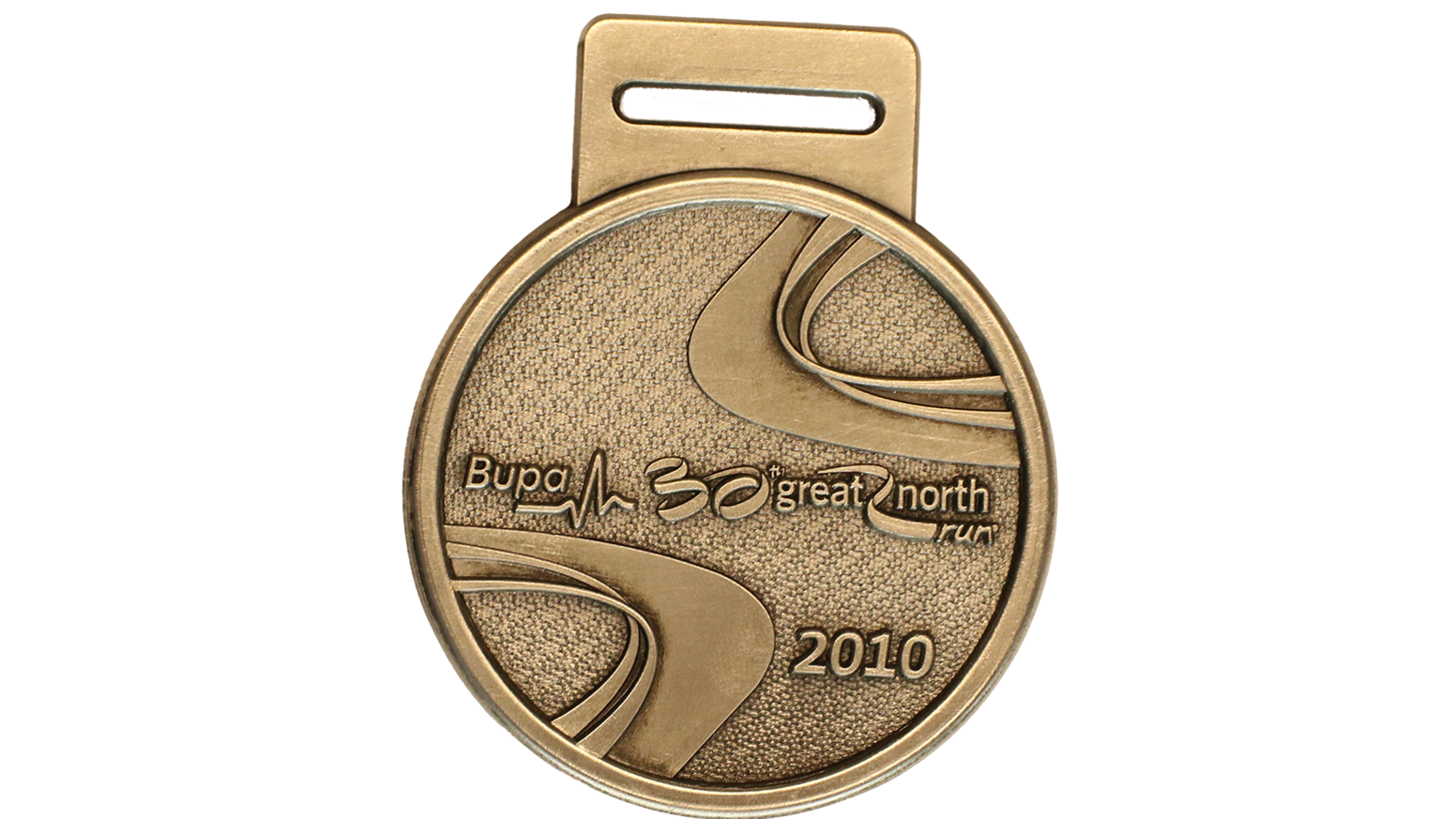 A gold circular medal that has a wave on and reads 'Bupa 30th great north run 2010'.