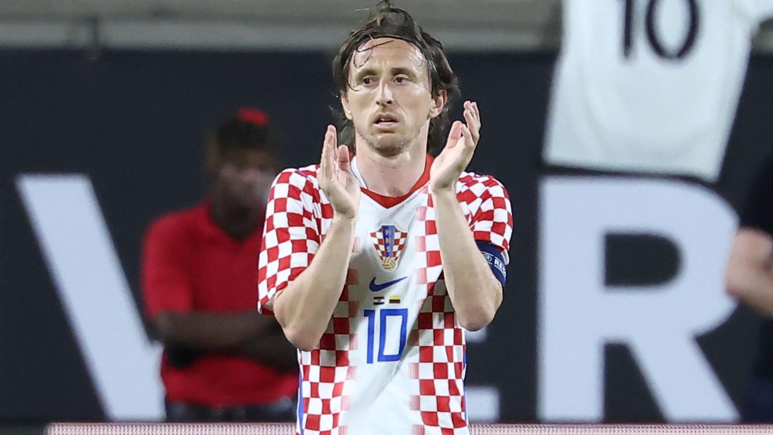 Luka Modric claps at the end of a match for Croatia 