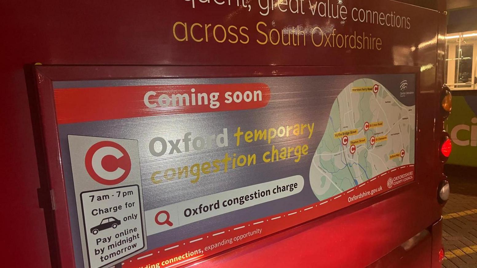 The back of a bus, advertising the temporary Oxford congestion charge