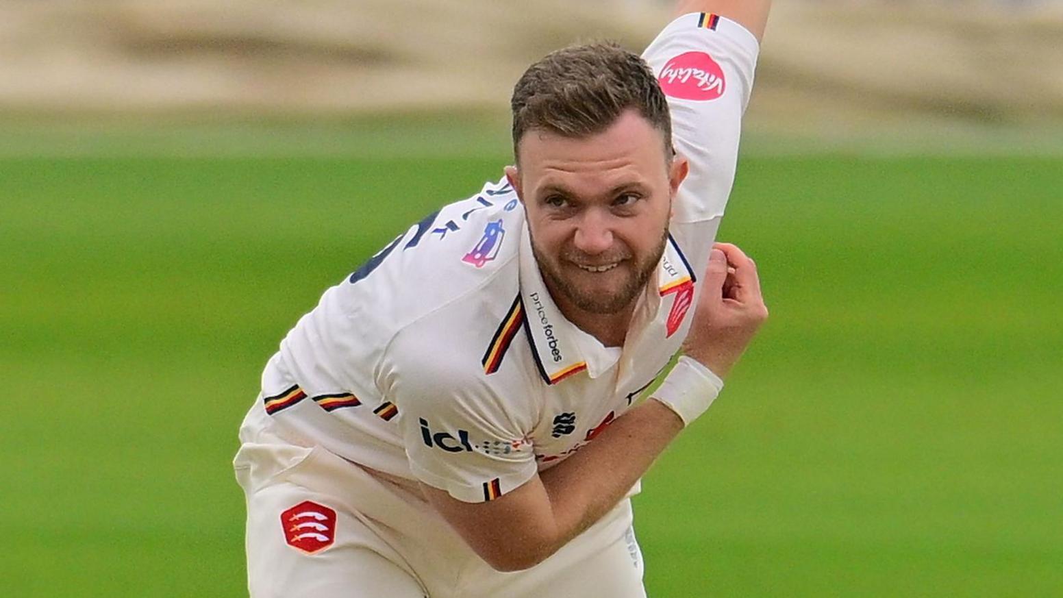 Sam Cook bowling for Essex