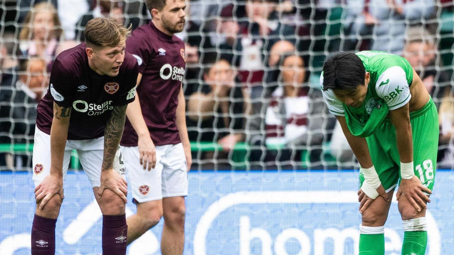 Hearts' Frankie Kent and Hibs' Kwon Hyeok-kyu