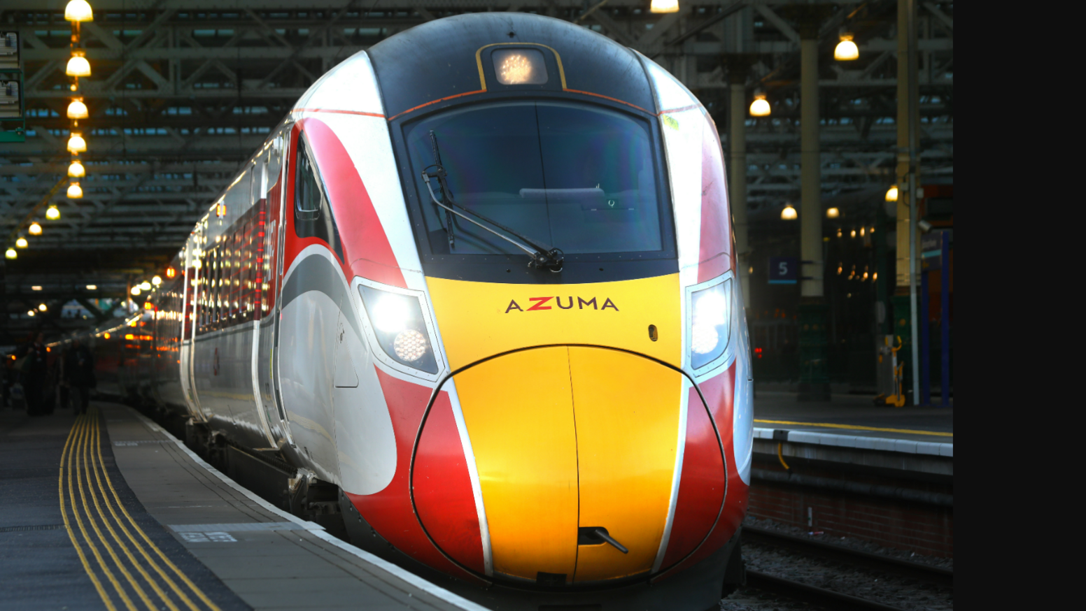 A close up image of an Azuma train at a station 