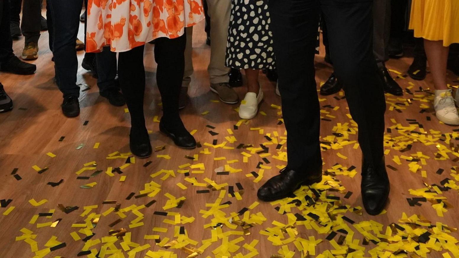 Floor with yellow confetti