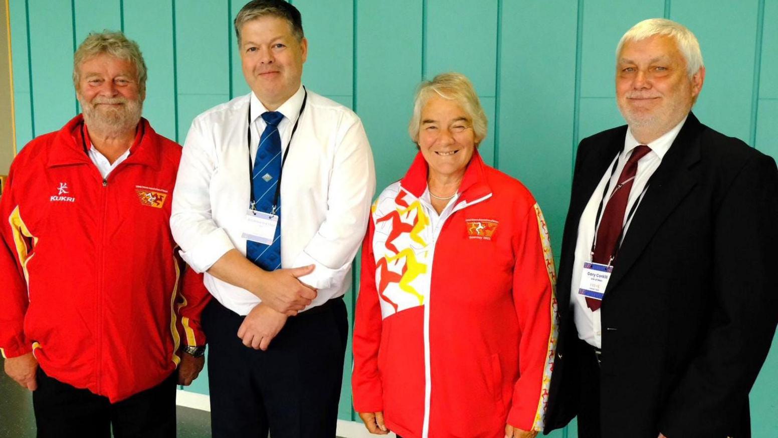 Three members of the Isle of Man Island Games Association with interim chairman of the association Andrew Inkster