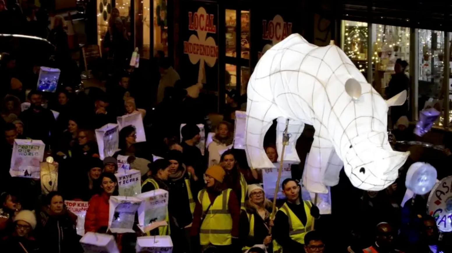 A white rhino lantern being paraded through Bedminster as part of the annual winter lantern parade