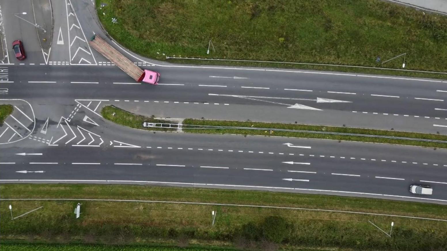 A view from above of the junction showing a lorry merging onto the road