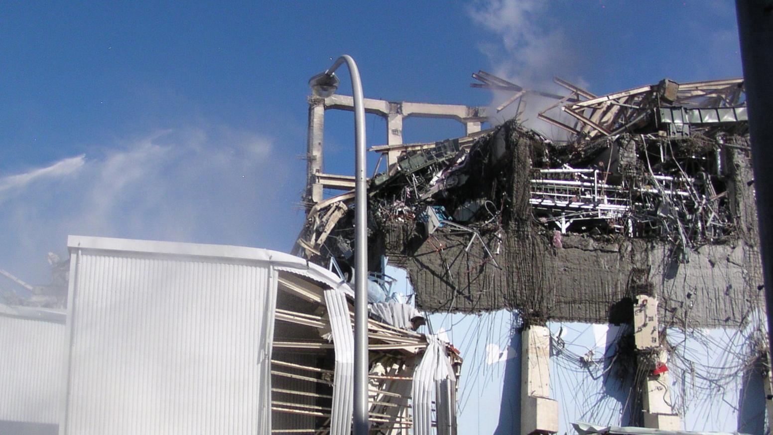 Water being discharged against unit 3 reactor building at the Fukushima Dai-ichi nuclear plant.