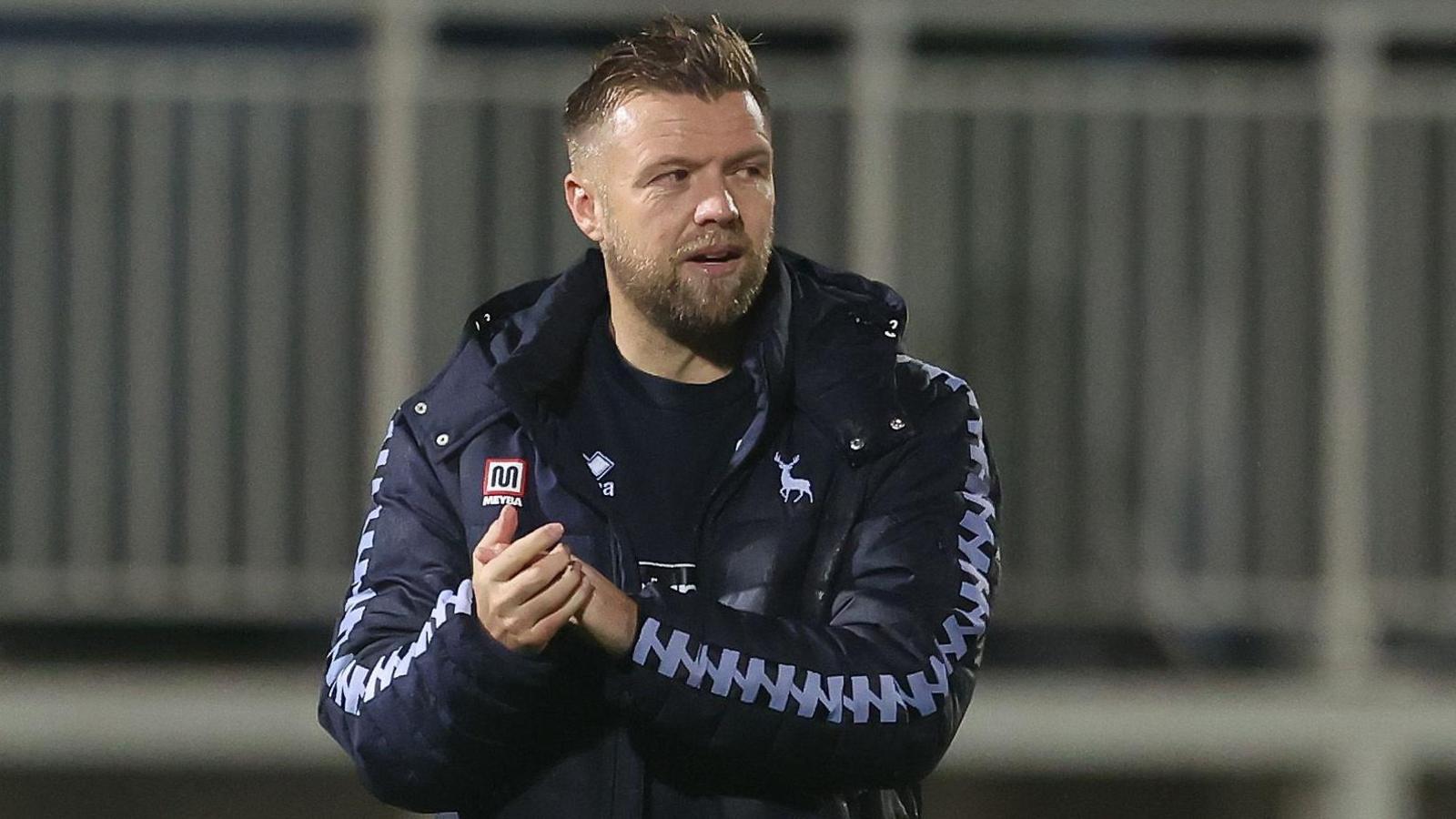Nicky Featherstone claps the Hartlepool fans after a National League game
