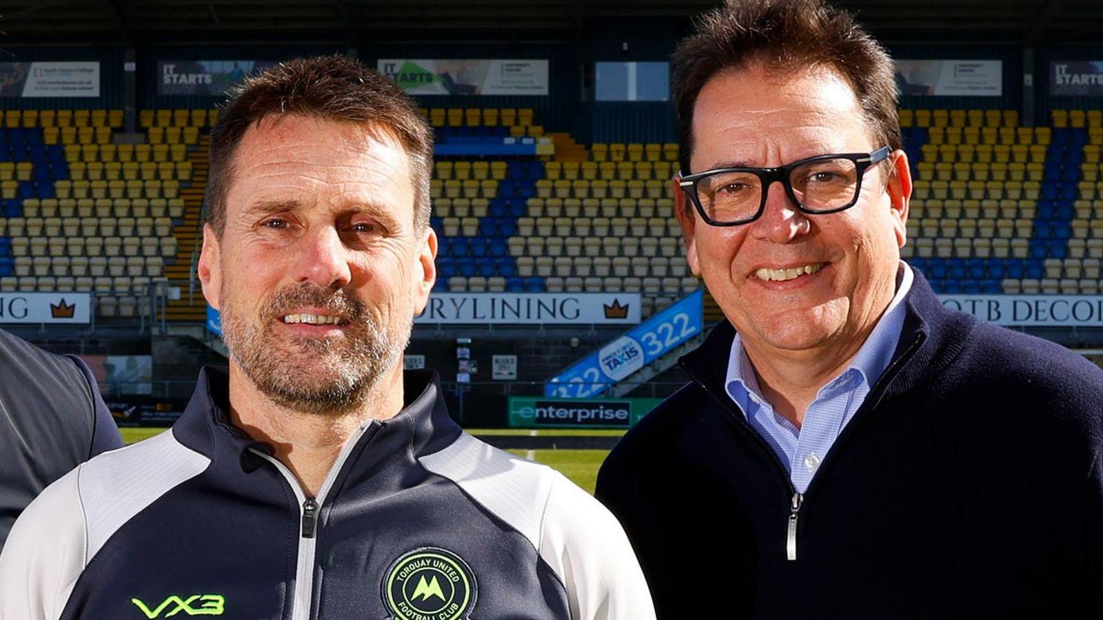 Michael Westcott (right) poses with Torquay United manager Jimmy Ball