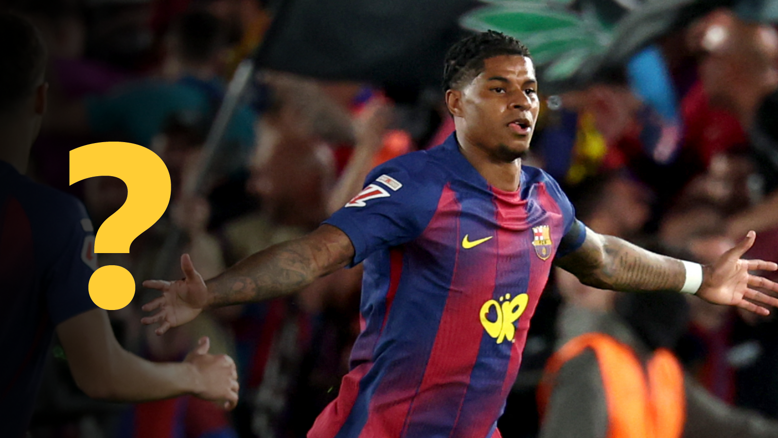 Marcus Rashford celebrating a Barcelona goal