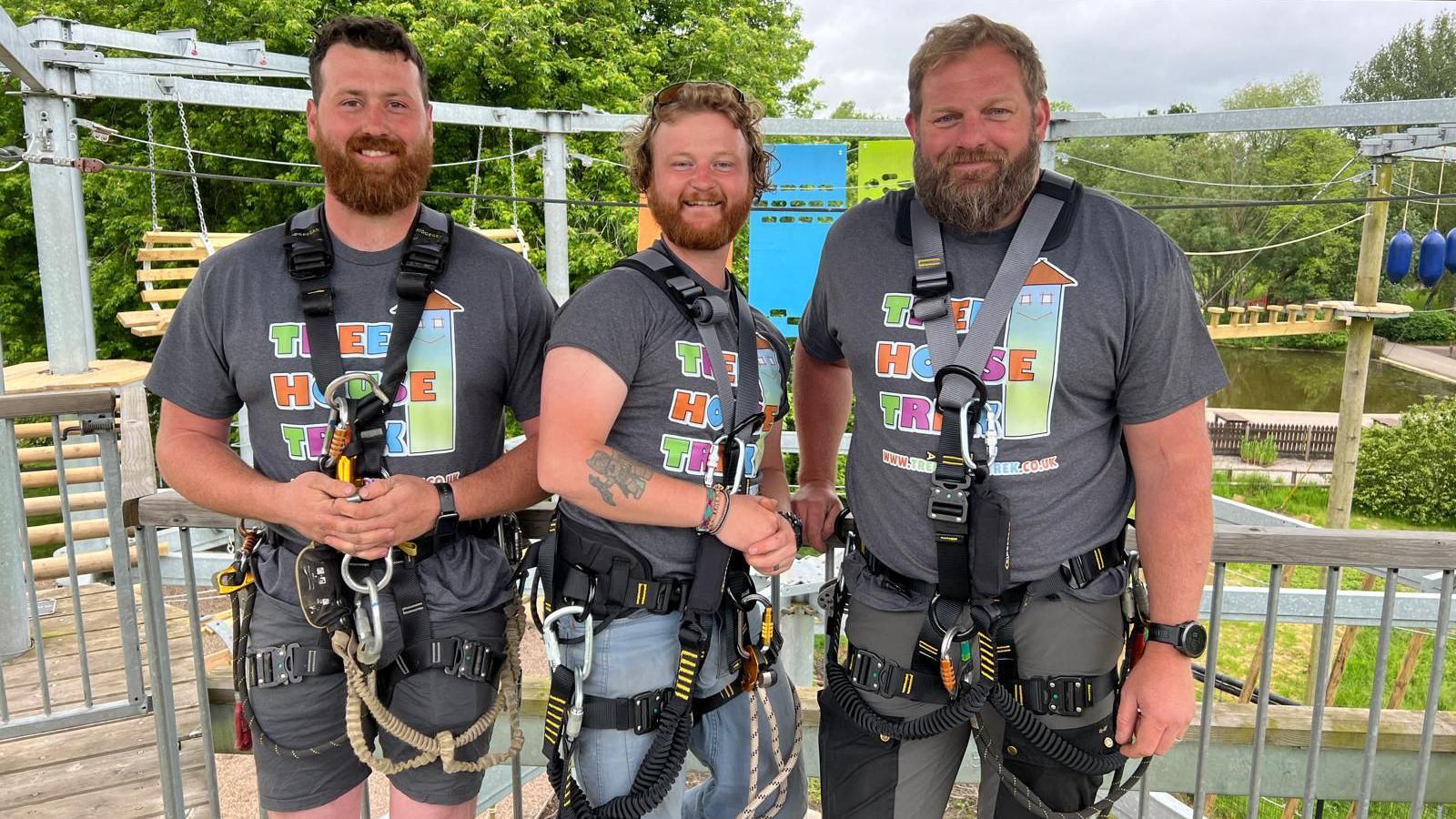 Sean Whitty, Al Pearson and Ali Glendinning standing on the high ropes course