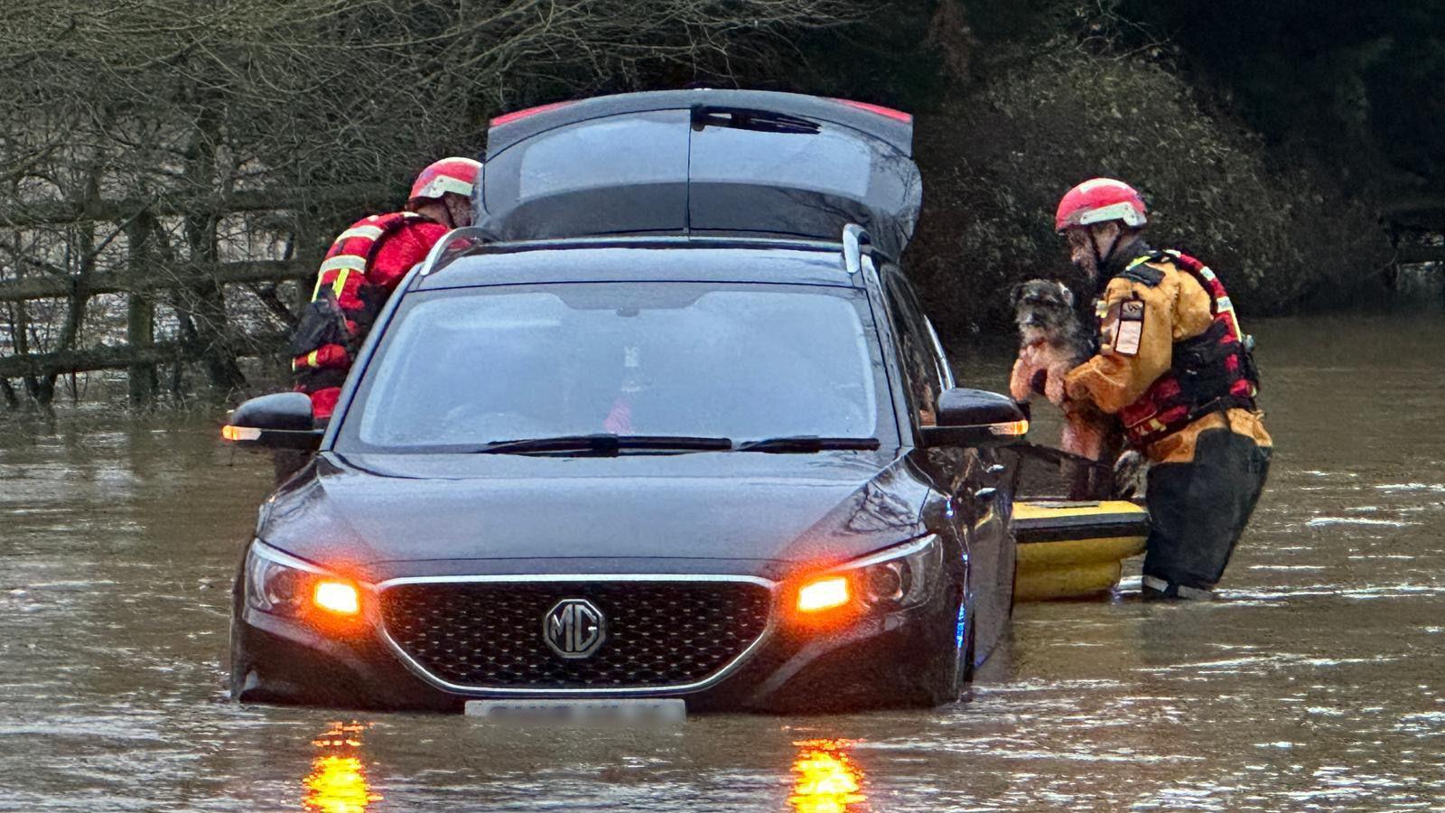 Car stranded in flood water