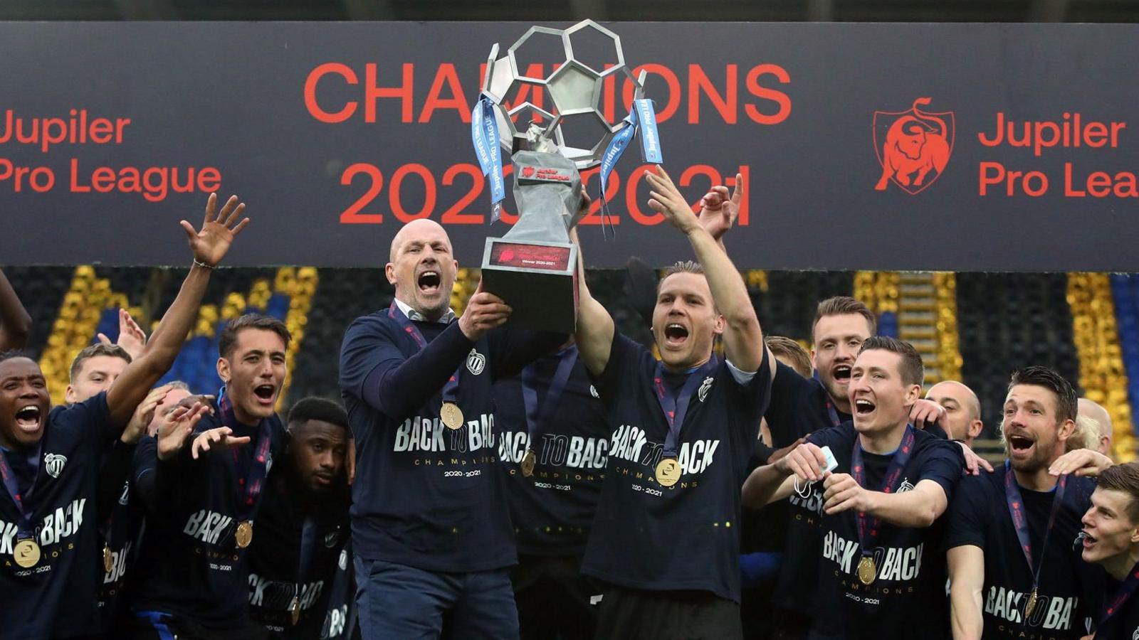 Philippe Clement holds the trophy after Club Brugge won the Belgian title in 2021