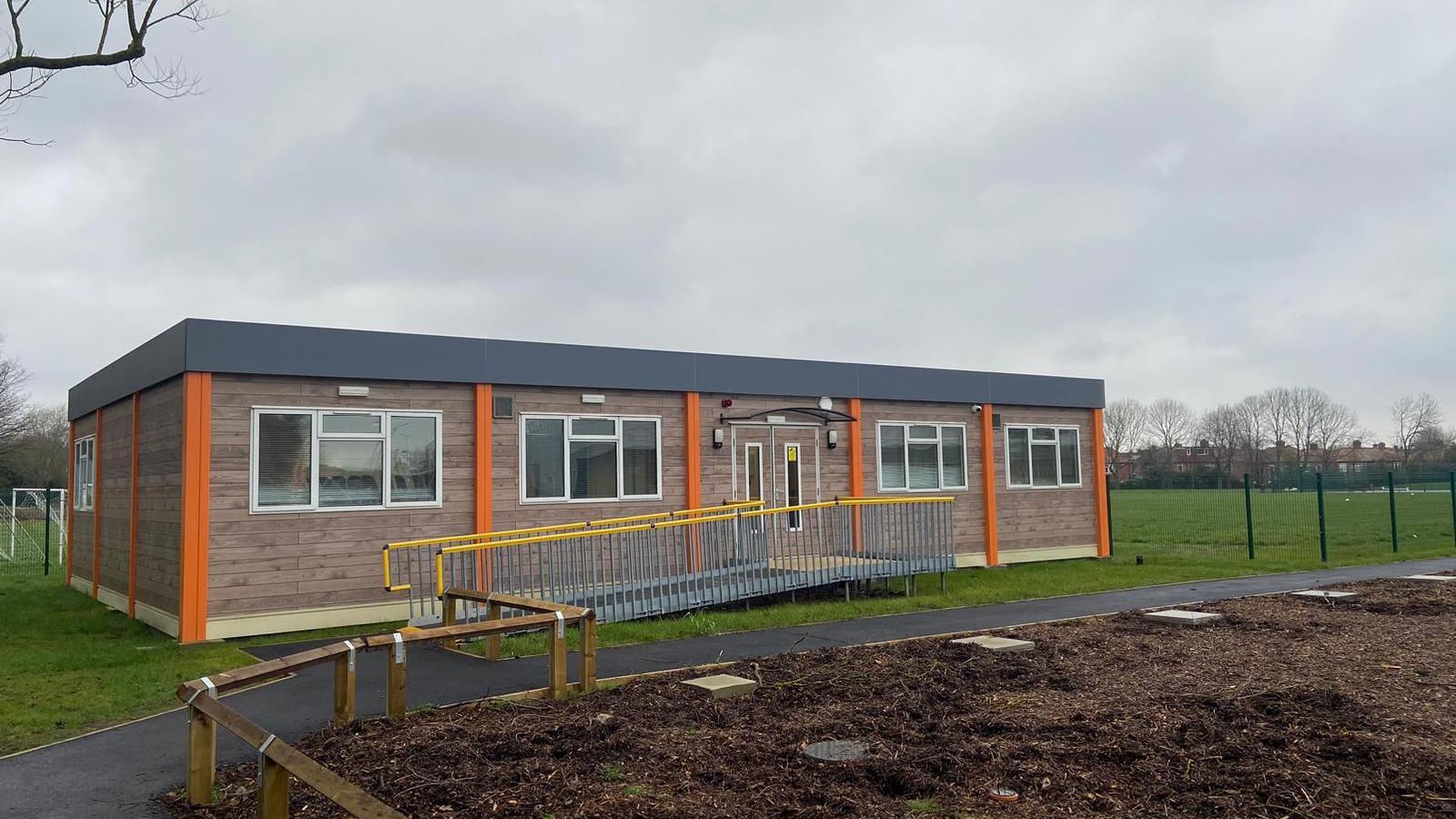 A temporary classroom on a playing field