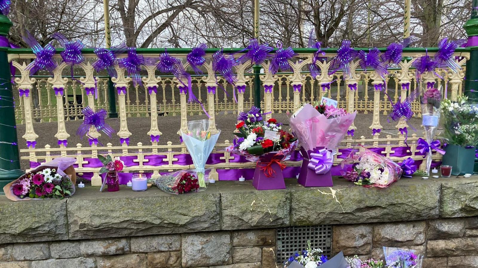 Purple floral tributes