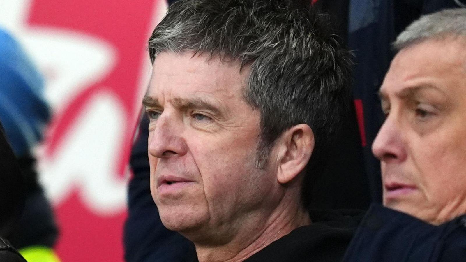 Noel Gallagher looking serious at the Bournemouth game