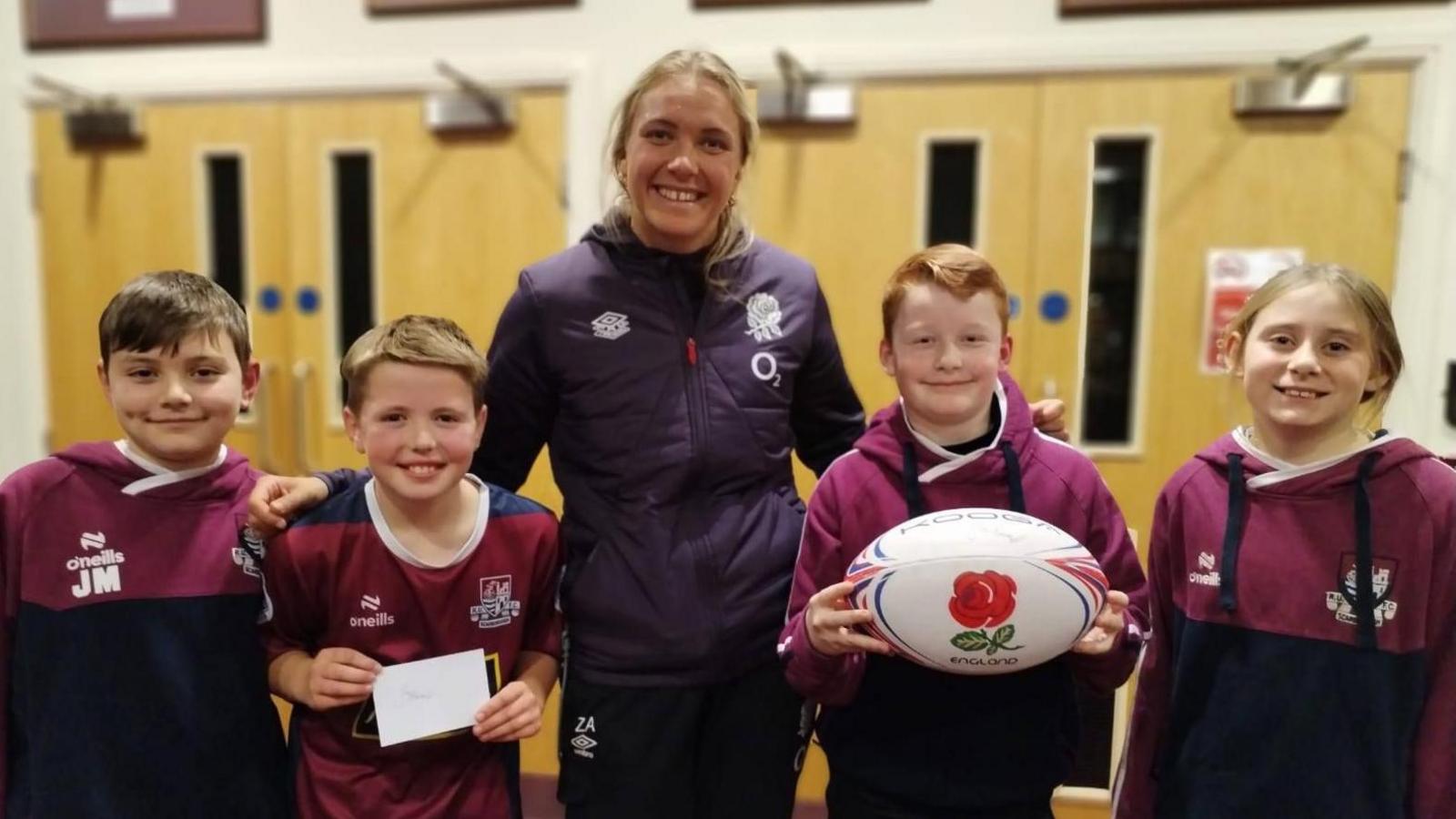 Zoe Aldcroft and four young players from Scarborough RUFC 