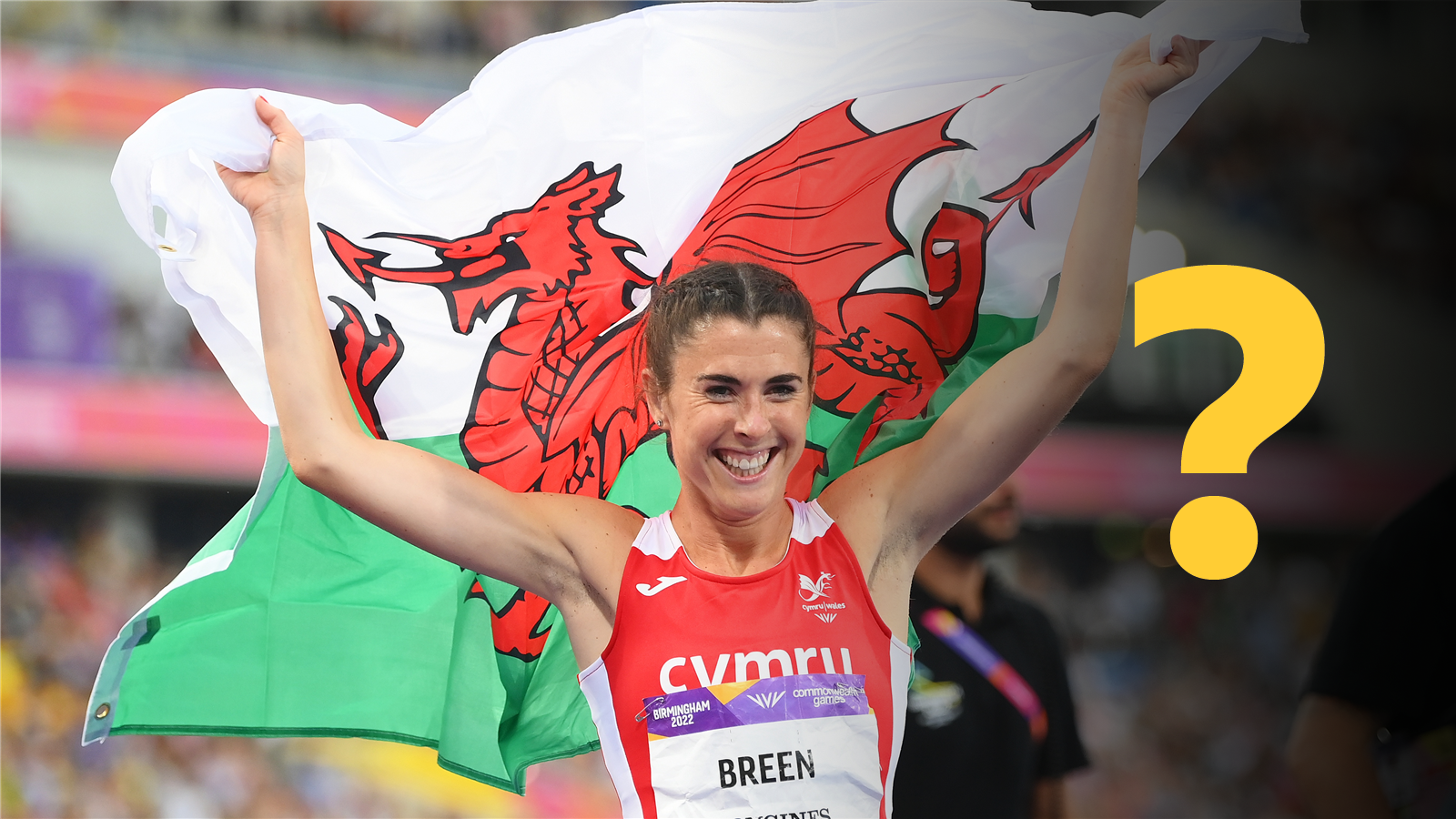 Olivia Breen with a Welsh flag