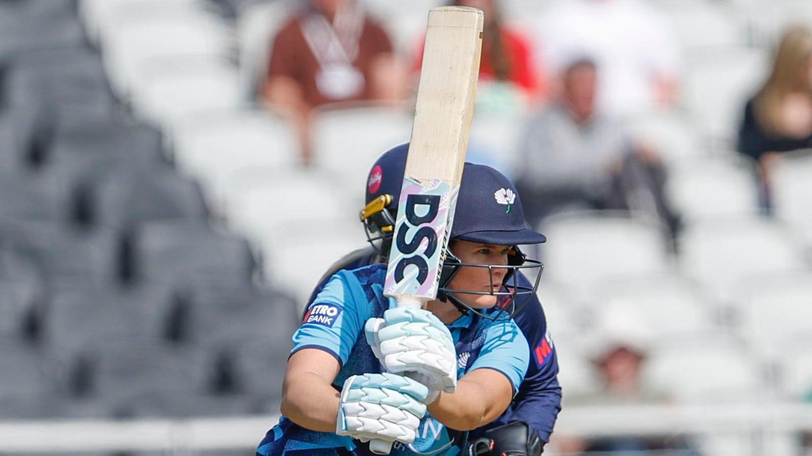 Jess Jonassen punching a shot into the off side for Yorkshire against Lancashire at Emirates Old Trafford.