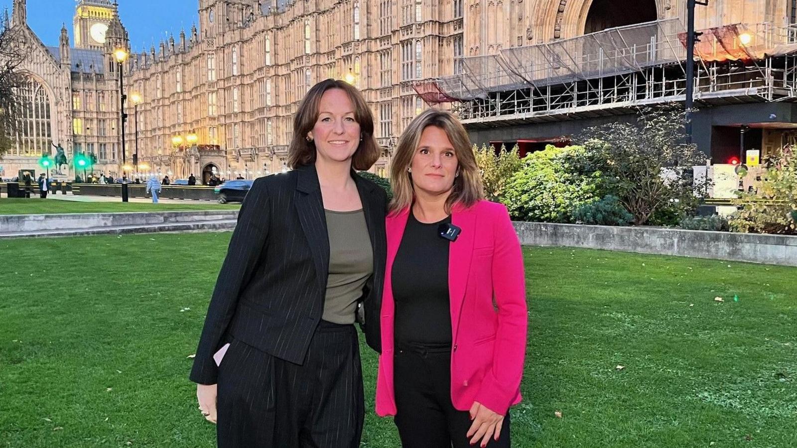 MP Lola McEvoy stood outside the houses of parliament with Ellen Roome.