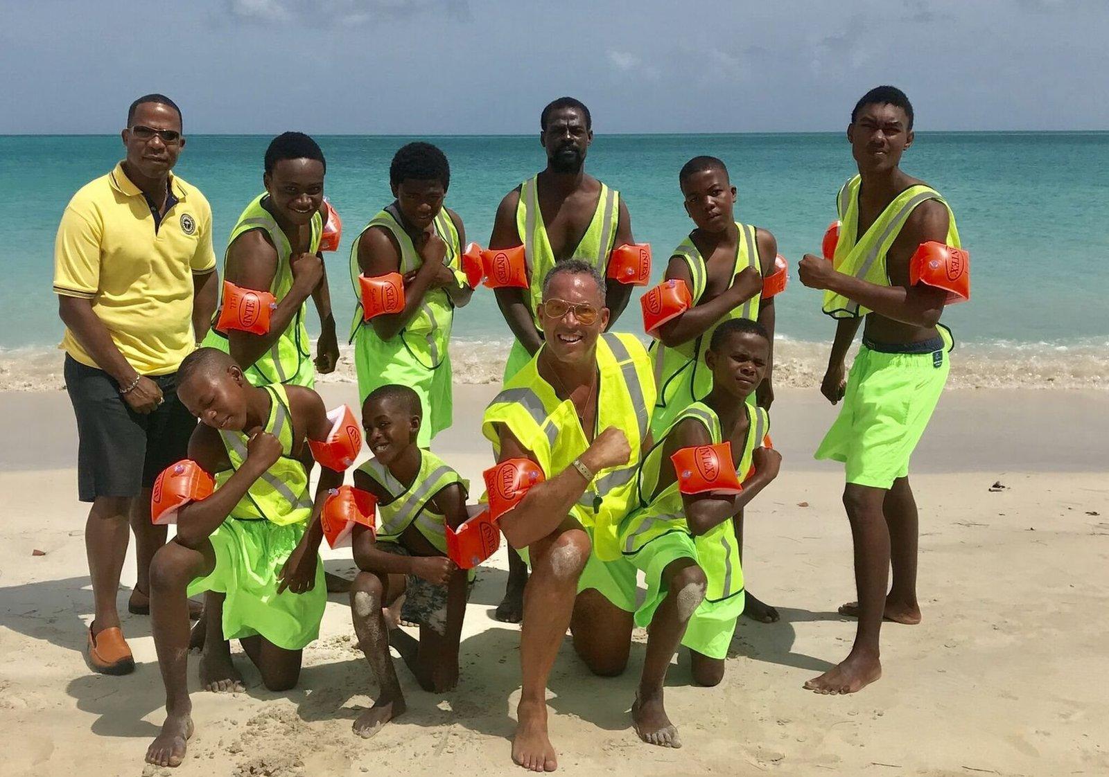 Stevan Lynn poses with a group of youngsters