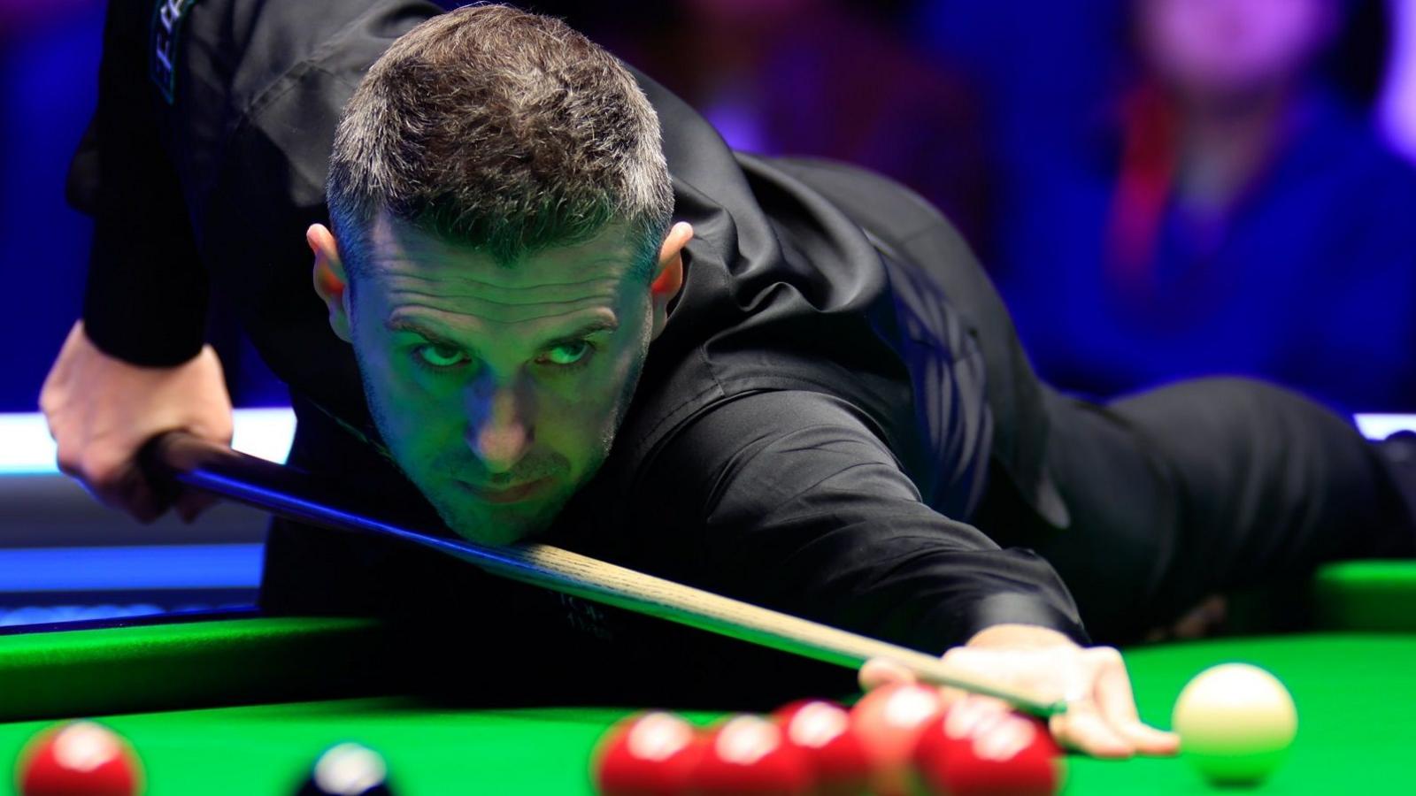 Mark Selby plays a shot in Llandudno