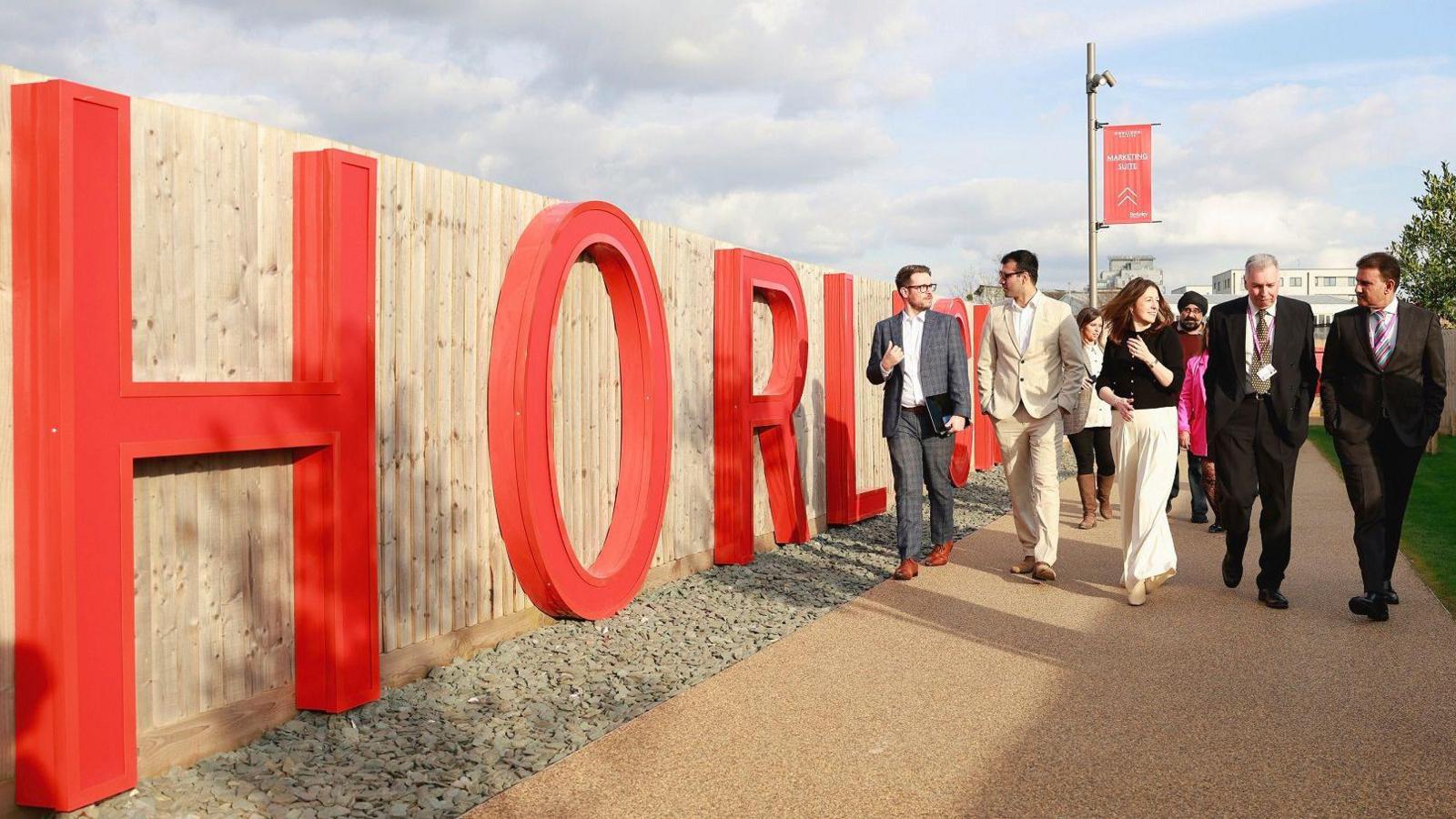 The red lettering on the pedestrian walkway