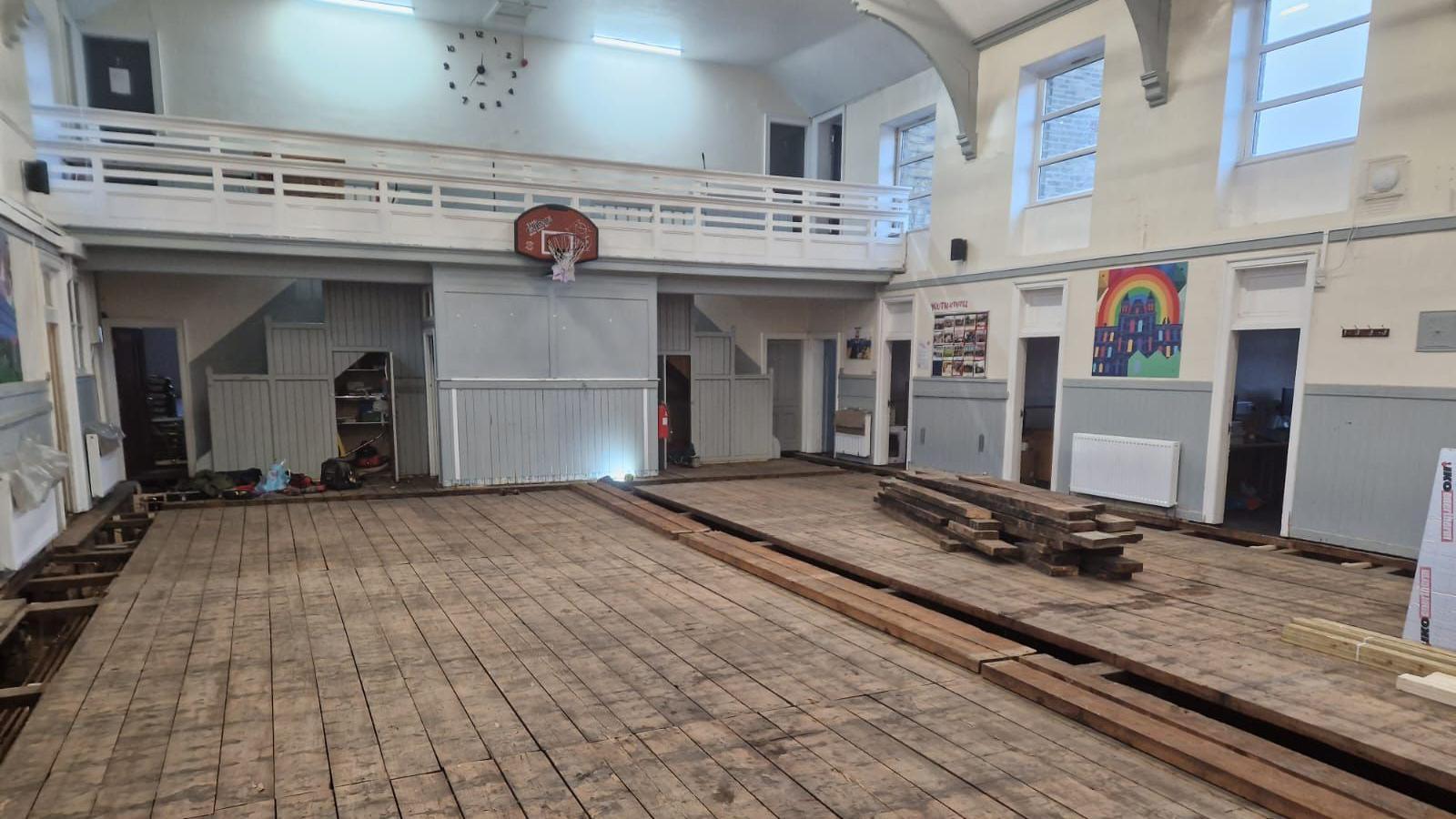 Floor in the Sangat Centre main hall being renovated