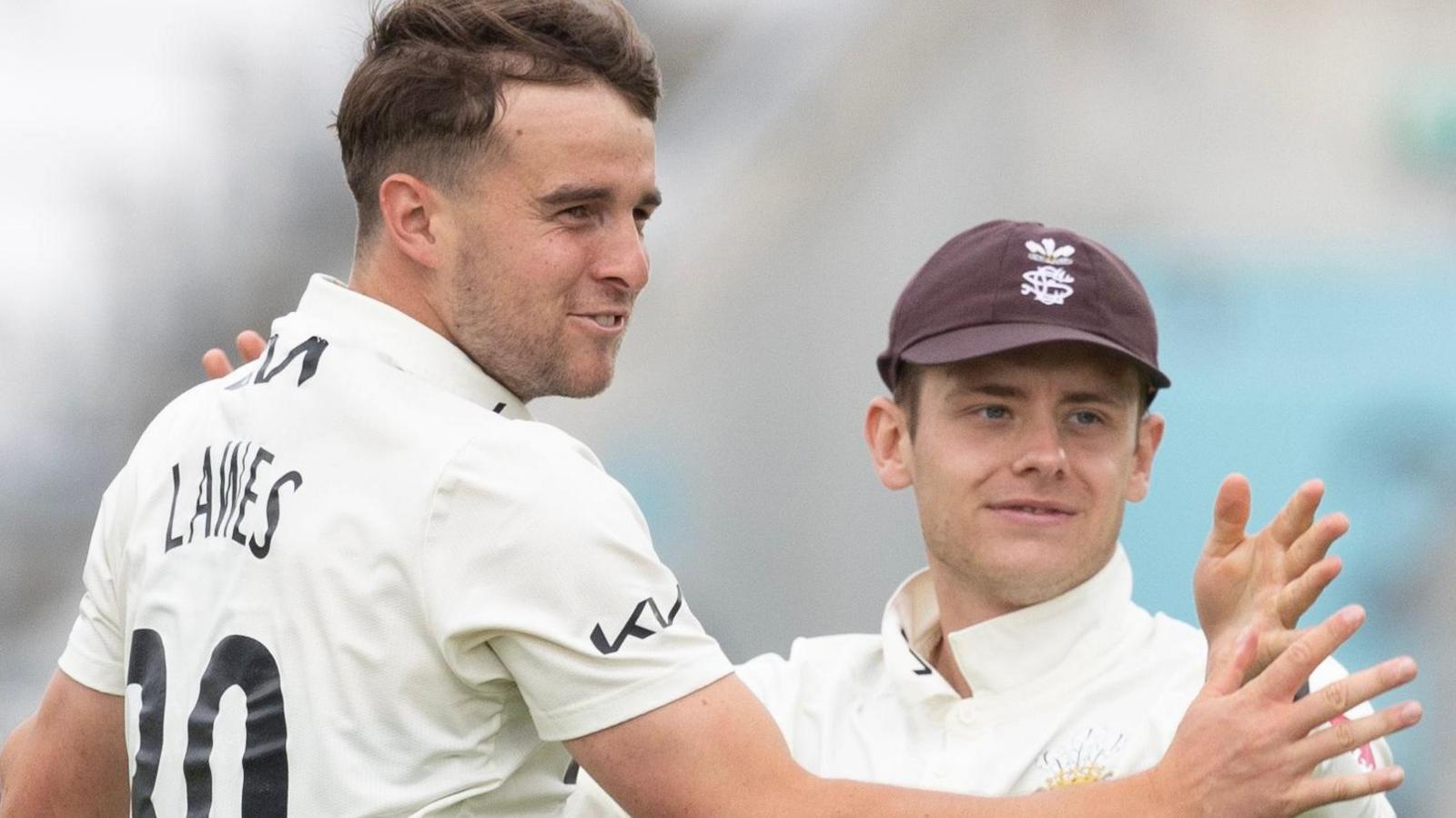 Surrey celebrate taking wicket