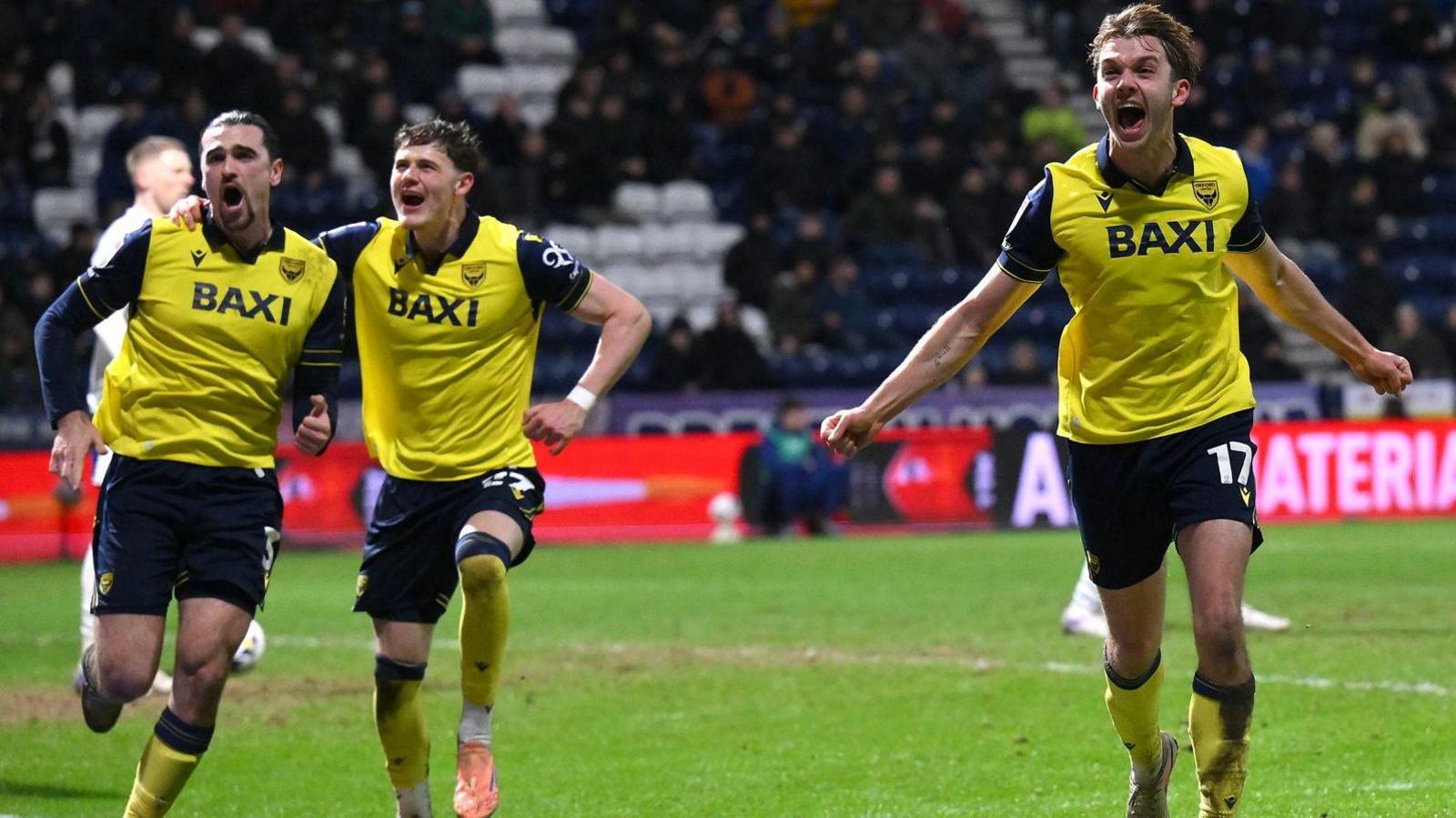 Oxford United players celebrate Ciaron Brown's goal at Preston at the start of March