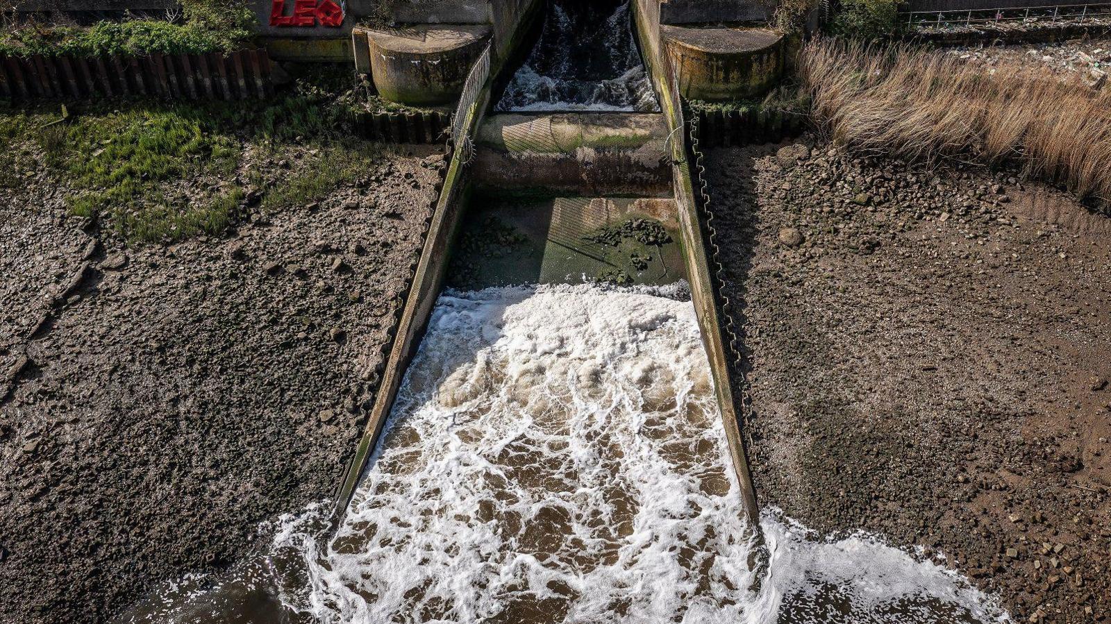 Discharge is seen flowing into the River Thames at Crossness sewage treatment works