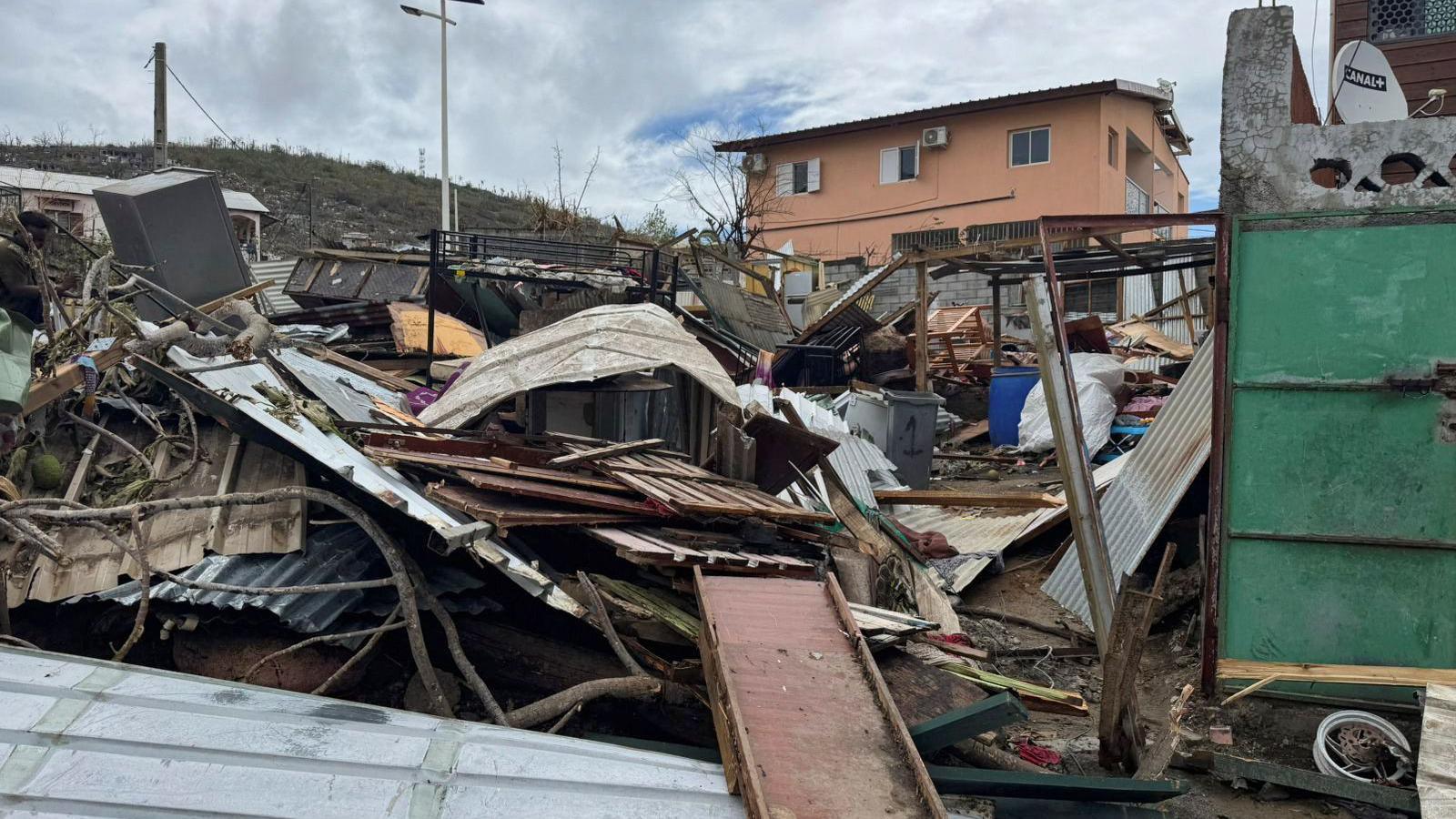 Debris of old houses in a pile on the floor.