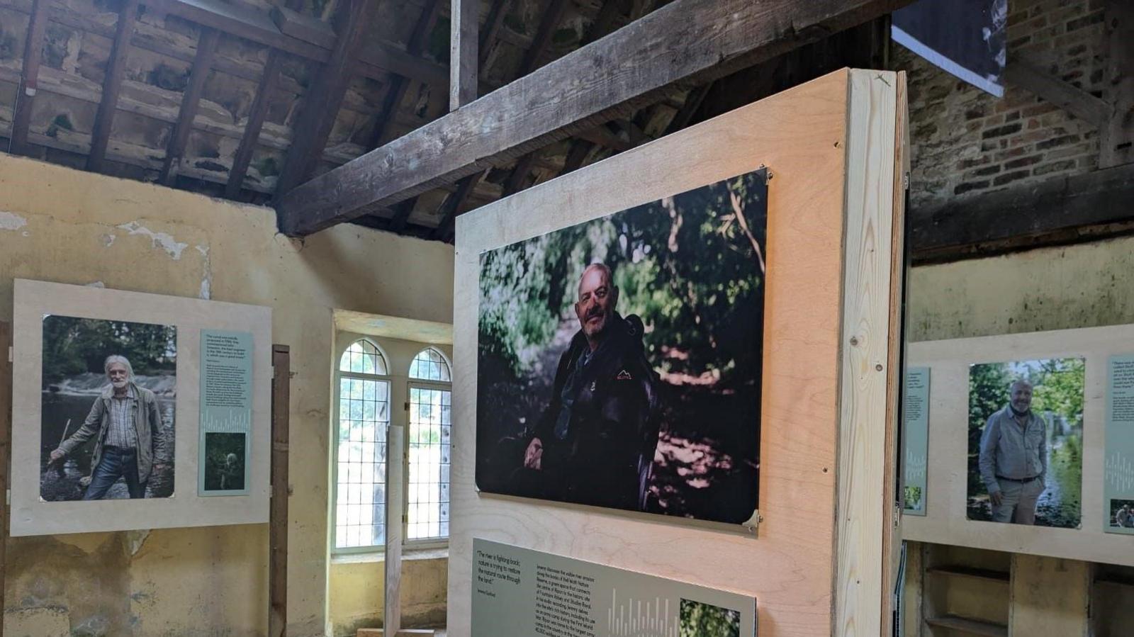 Images of people connected to the Skell Valley on walls in Fountains Mill 