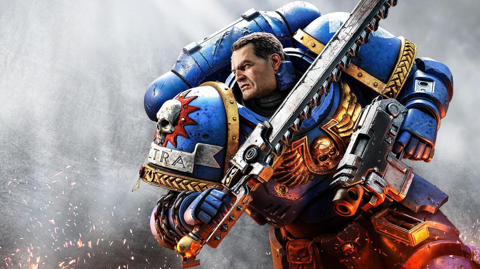 Detailed artwork shows a character in bulky, futuristic armour leaning forward as he rushes towards an unseen foe. He holds an oversized pistol in one hand and a large sword with chainsaw-like teeth running down one side of the blade. On his oversized shoulder covering is a skull with a banner reading "Ultra" embossed underneath it.